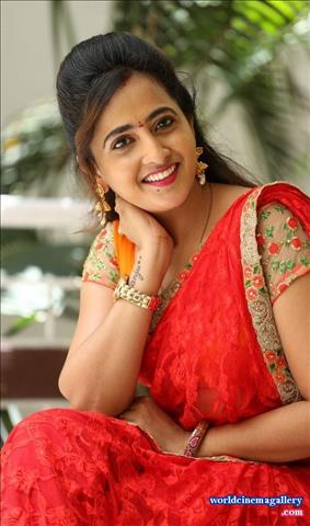 Anchor Lasya Latest Stills in Orange Saree