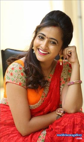 Anchor Lasya Latest Stills in Orange Saree