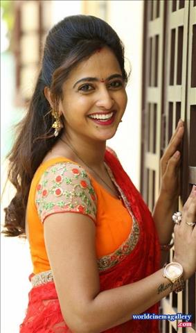 Anchor Lasya Latest Stills in Orange Saree
