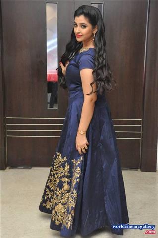 Anchor Syamala in Blue Dress Stills at Next Nuvve Movie Audio Launch