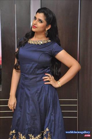 Anchor Syamala in Blue Dress Stills at Next Nuvve Movie Audio Launch