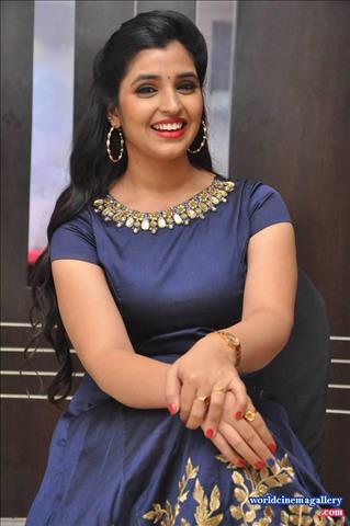 Anchor Syamala in Blue Dress Stills at Next Nuvve Movie Audio Launch