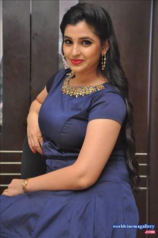 Anchor Syamala in Blue Dress Stills at Next Nuvve Movie Audio Launch