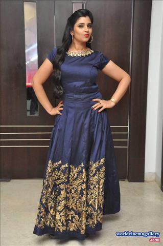 Anchor Syamala in Blue Dress Stills at Next Nuvve Movie Audio Launch
