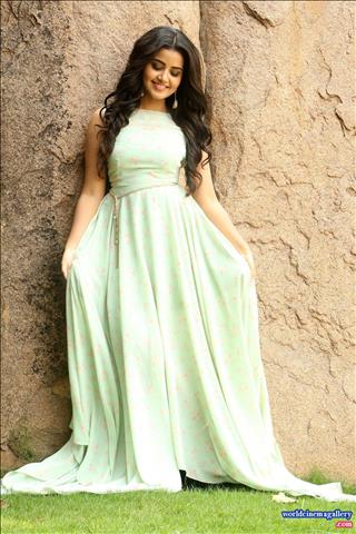 Anupama Latest Photoshoot stills in Green dress