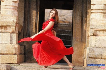 Pranitha latest stills in Green Half saree