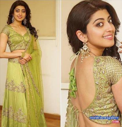 Pranitha latest stills in Green Half saree