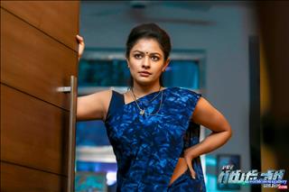 Pooja Kumar blue saree stills from PSV Garuda Vega 