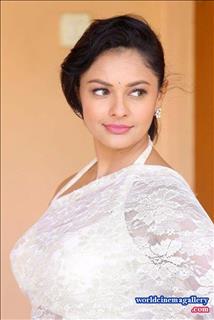 Pooja Kumar latest stills from PSV Garuda Vega press meet in white saree
