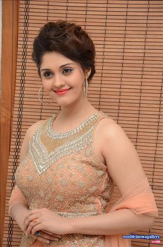 Surabhi Photos In Pink Dress At Audio Launch