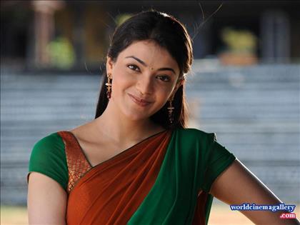 Kajal Agarwal Cute Stiils in Green Half Saree