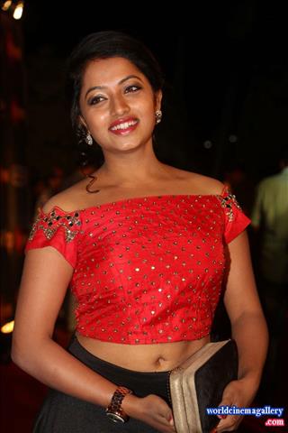 Navya swamy latest Stills in red dress at Vani Rani Serial