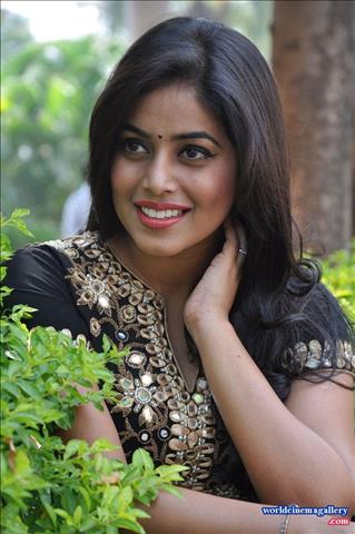 Poorna Cute Stills at RGG Success meet in black  dress