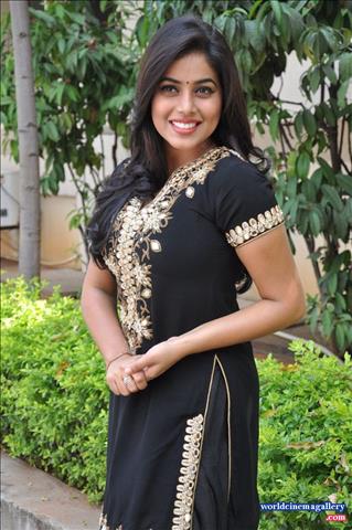 Poorna Cute Stills at RGG Success meet in black  dress