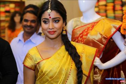 Shriya Saran in Traditional Yellow Saree At Showroom Launch