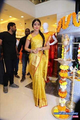 Shriya Saran in Traditional Yellow Saree At Showroom Launch
