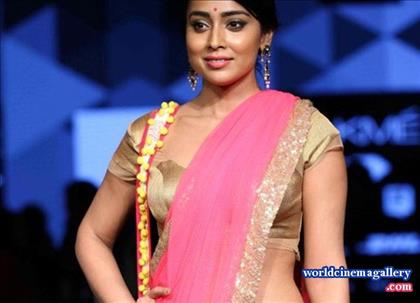 Shriya Saran Latest Photos at IIFA Utsavam Awards In Red Saree
