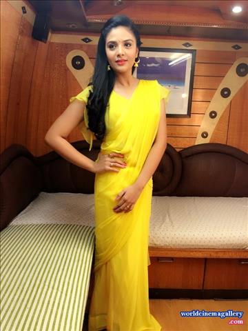 Sreemukhi Cute in Yellow Saree 