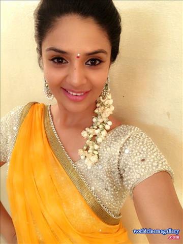 Sreemukhi Cute in Yellow Saree 