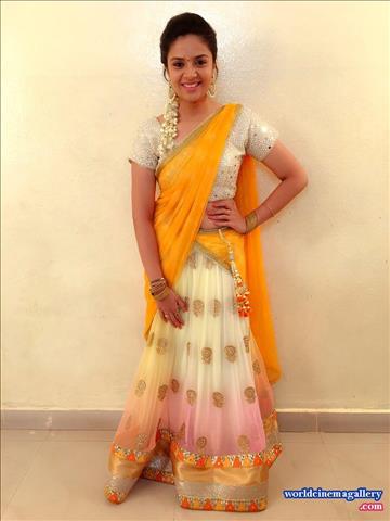 Sreemukhi Cute in Yellow Saree 