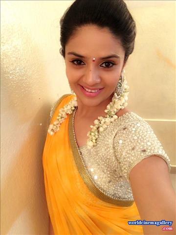 Sreemukhi Cute in Yellow Saree 