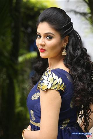 Sreemukhi latest stills in Blue Dress