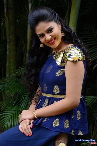 Sreemukhi latest stills in Blue Dress