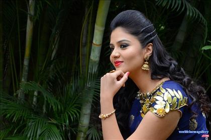 Sreemukhi latest stills in Blue Dress