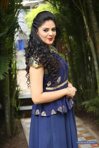 Sreemukhi latest stills in Blue Dress