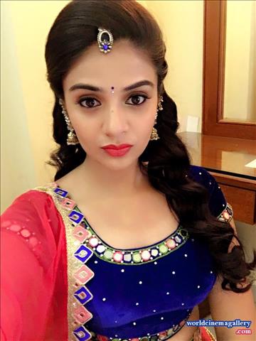Sreemukhi latest stills in Blue Salwar