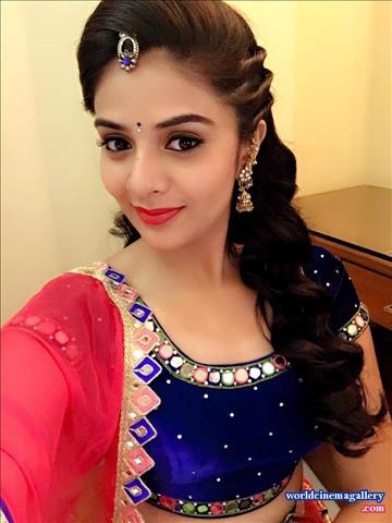 Sreemukhi latest stills in Blue Salwar