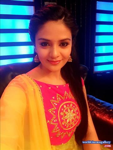 Sreemukhi latest stills in Yellow Salwar