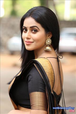 Poorna Stills in Black Dress