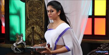 Poonam Bajwa Hot Yellow Saree Images in Aranmanai 2 - World Cinema Gallery