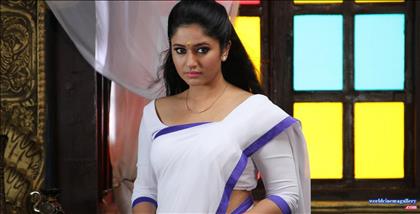 Poonam Bajwa Hot Yellow Saree Images in Aranmanai 2 - World Cinema Gallery