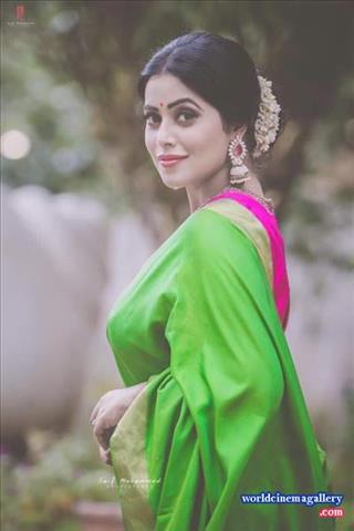 Poorna Stills in Red Saree