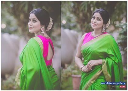 Poorna Stills in Red Saree