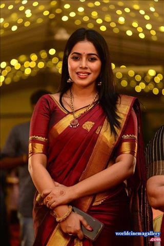 Poorna Stills in Red Saree
