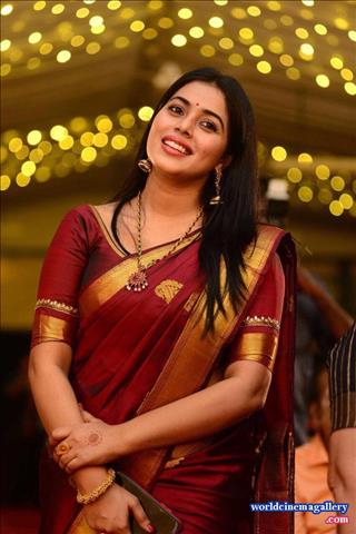 Poorna Stills in Red Saree