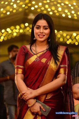 Poorna Stills in Red Saree