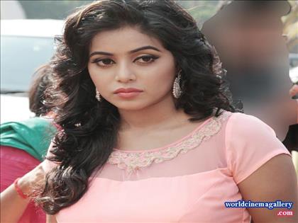 Poorna Stills in Rose dress