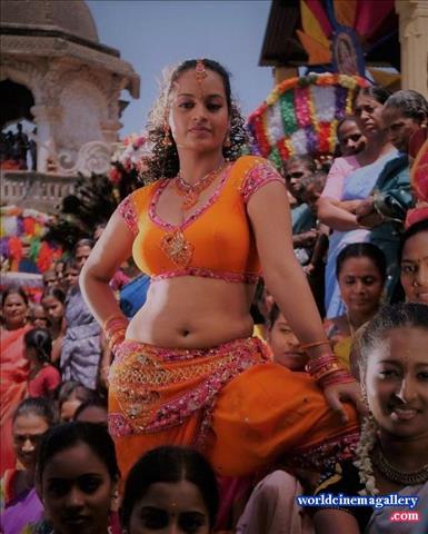 Suja Varunee Hot Stills in Orange Dress