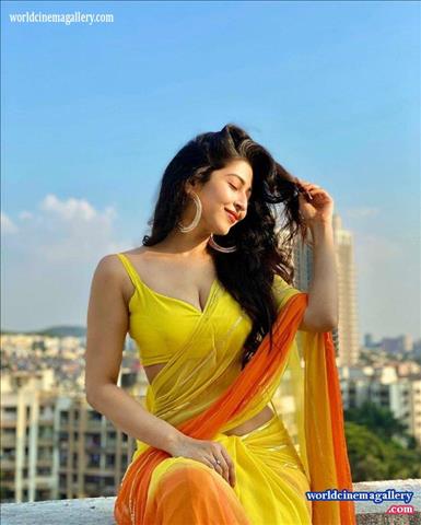 Sonarika Bhadoria hot yellow saree stills